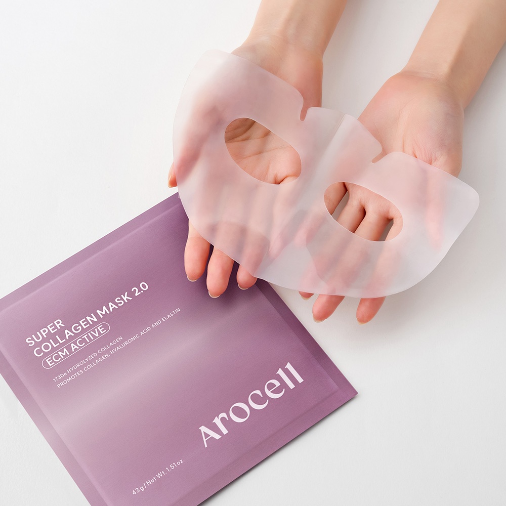 Hands Holding Unfolded Translucent 43g Bio-Collagen Mask