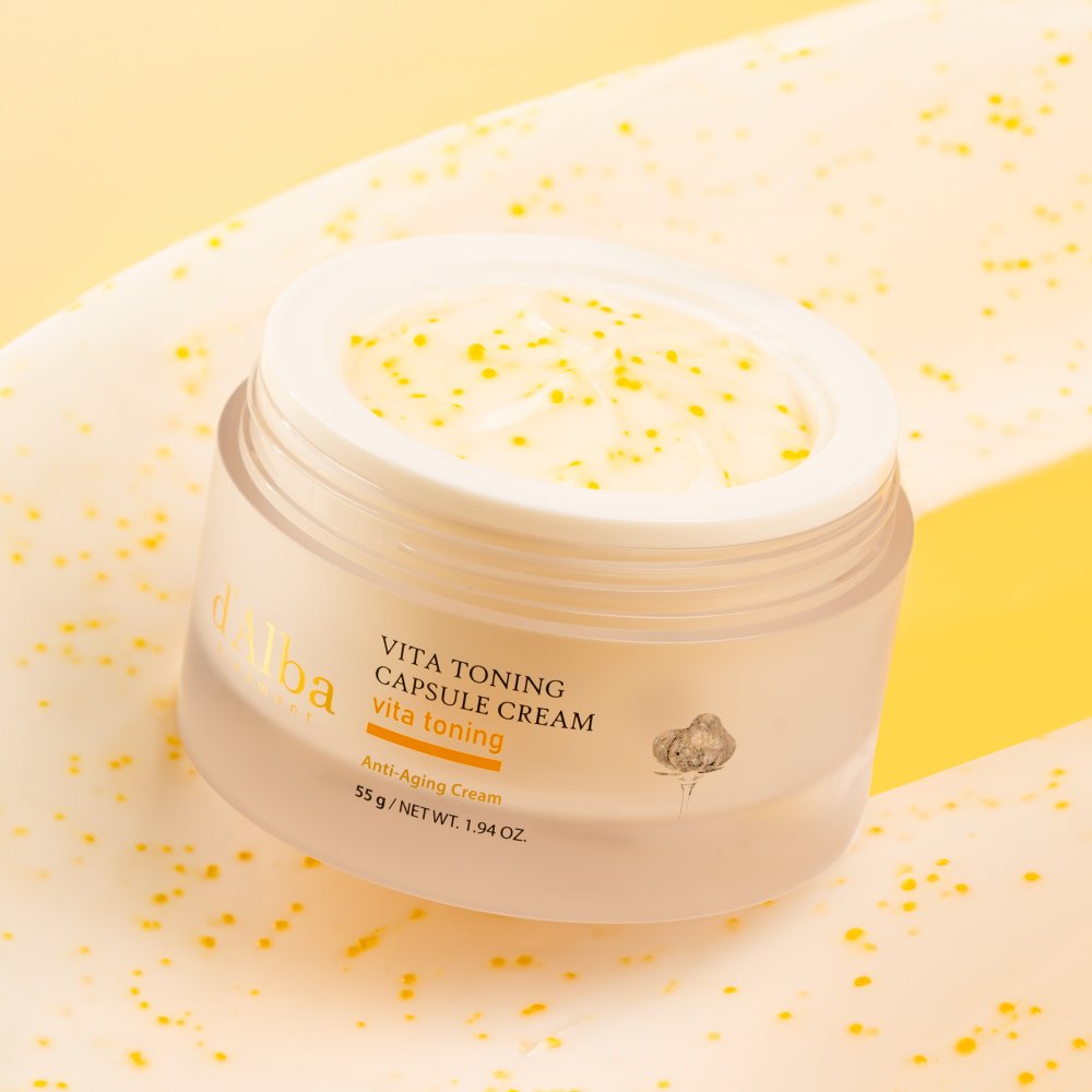 d'Alba Vita Toning Capsule Cream jar open with golden capsules